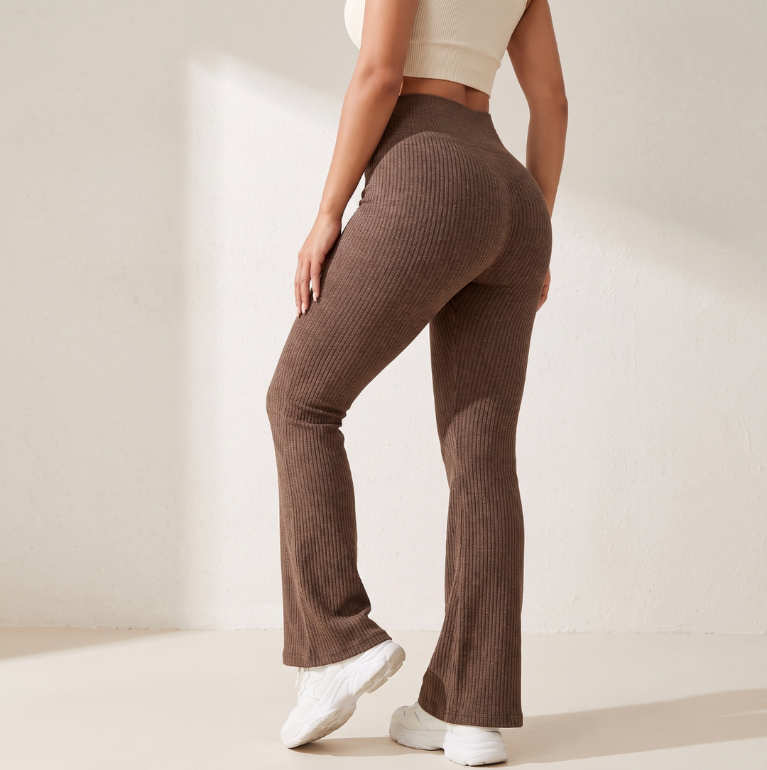 Brown high waisted ribbed flare leggings on model