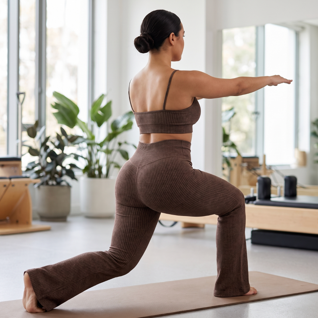 Brown flare leggings worn for a studio stretching session